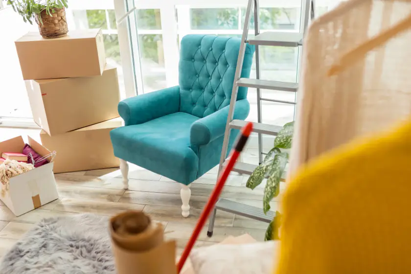 Cartons and furniture mid-move in a Dubai apartment